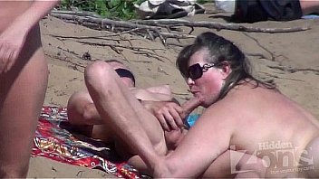spycam oral job on a naturist beach
