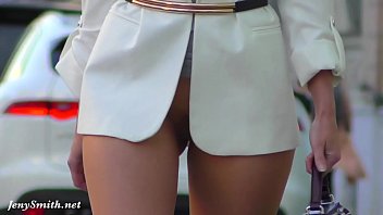 Woman on the street in sans underpants. Sexy bottomless chick