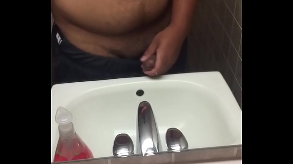 Thick 18 y/o wanks off in public bathroom