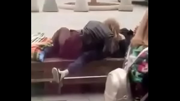 Stupid blonde gives oral in public
